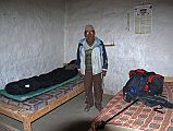Mustang Lo Manthang 01 02-1 My Room We had trouble finding a place to stay in Lo Manthang, but a man invited us to stay at his house  for a fee of course. Here he is with my basic but ok room.